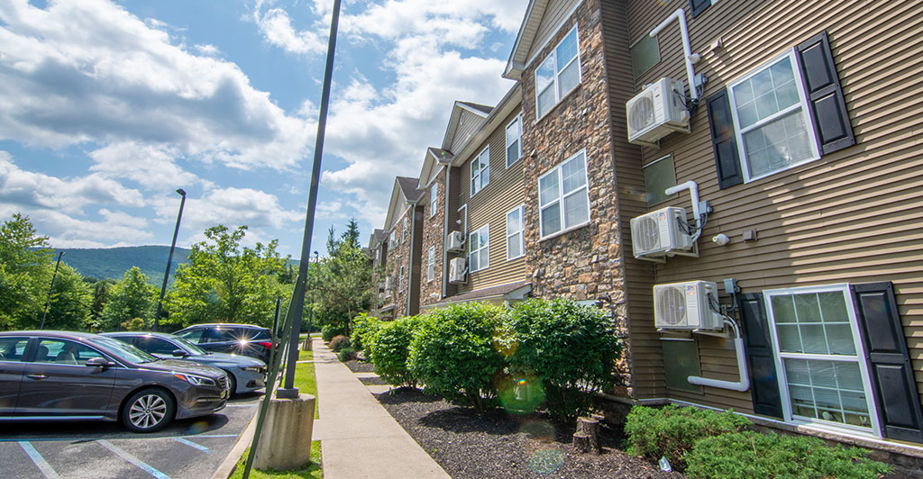 apartment complex with heat pumps