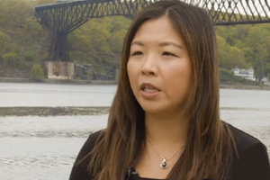 Central Hudson Environmental Affairs Coordinator talking near Hudson River