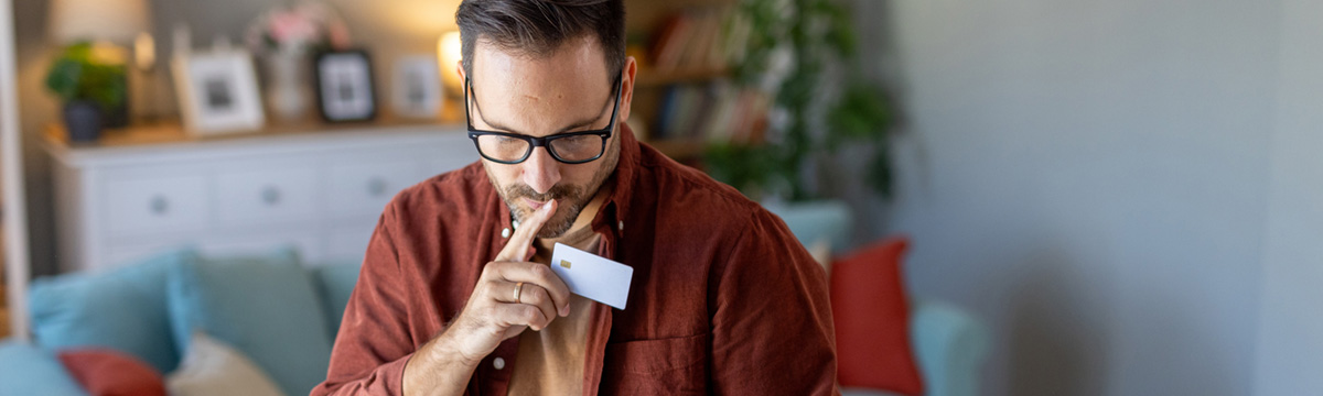Man contemplating a potential scam call.
