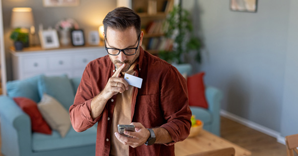 Man contemplating a potential scam call