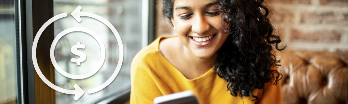 Happy woman looking at phone