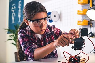 Young girl doing a science experiment