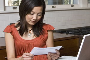 Woman viewing a bill