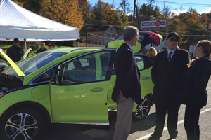 Electric vehicle enthusiasts at a drive electric event